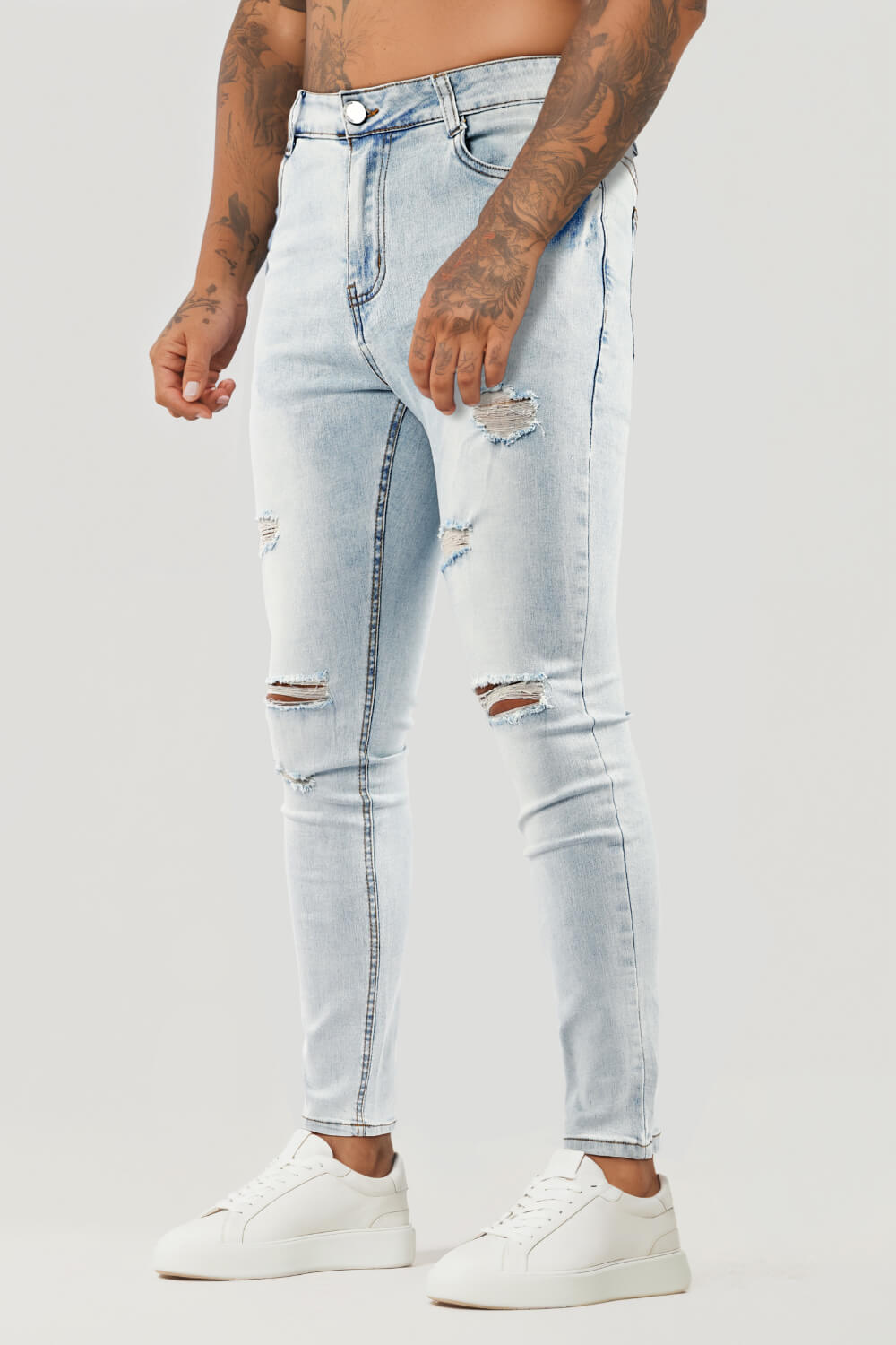 Jeans skinny con strappi al ginocchio da uomo Blu lavato