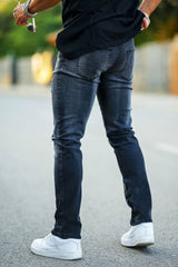 ripped knee black jeans