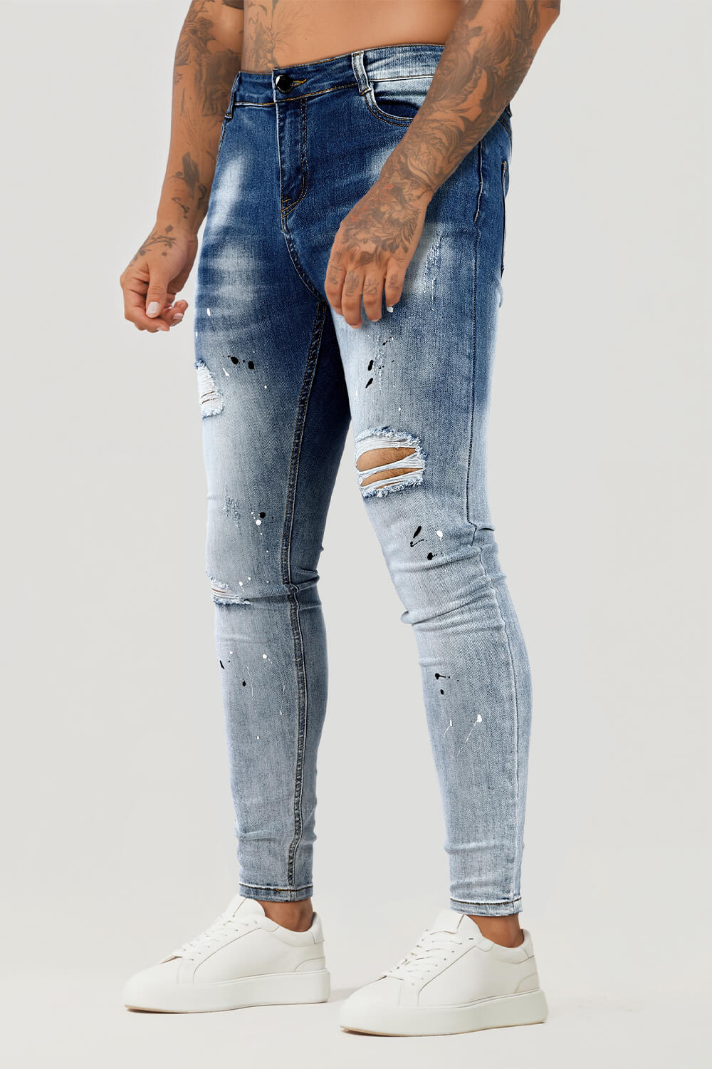 Men Blue Skinny Jeans Spray Paint For Sale - Main Image