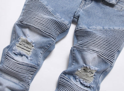 Ripped patchwork men's blue jeans