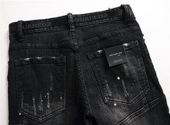 Ripped and spliced men's jeans
