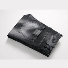 Men's jeans with ripped black paint