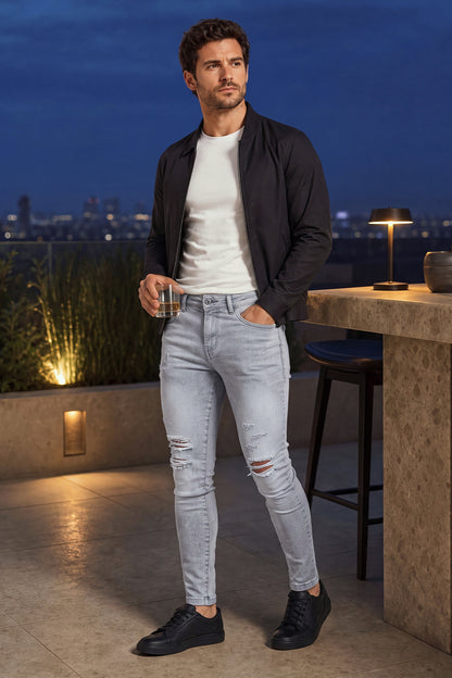 Jeans da uomo grigio marmo attillati lavati e strappati