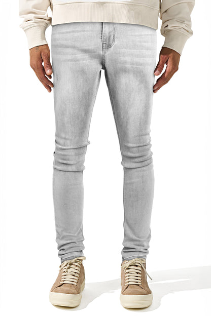 Jeans da uomo grigio marmo attillati lavati e strappati