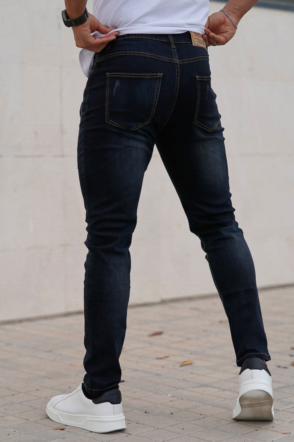 slim fit dark blue jeans