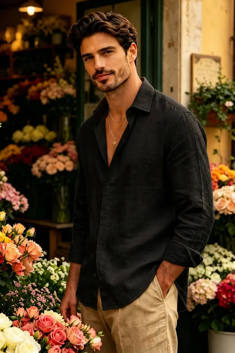 Man in black shirt and beige chinos at flower shop, stylish casual outfit