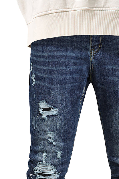Jeans skinny elasticizzati da uomo - Strappati