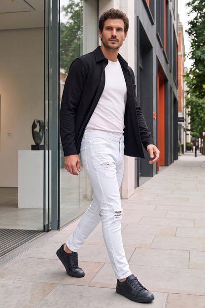 Calça jeans skinny masculina rasgada - branca