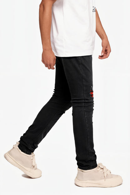 Skinny-Jeans mit zerrissenen Knien für Herren - Schwarz