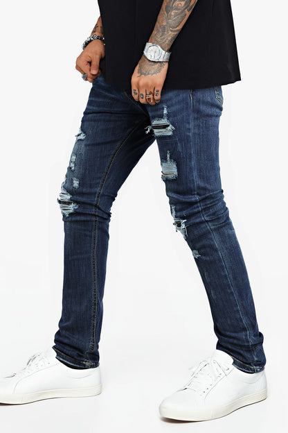 Jeans skinny elasticizzati da uomo - Strappati