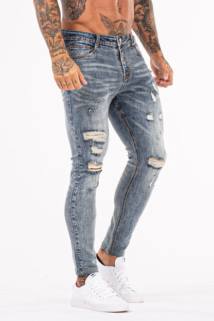 Heren GT-serie lichtblauwe gescheurde skinny jeans stretchjeans