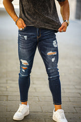 Jeans skinny strappati da uomo-jeans elasticizzati blu